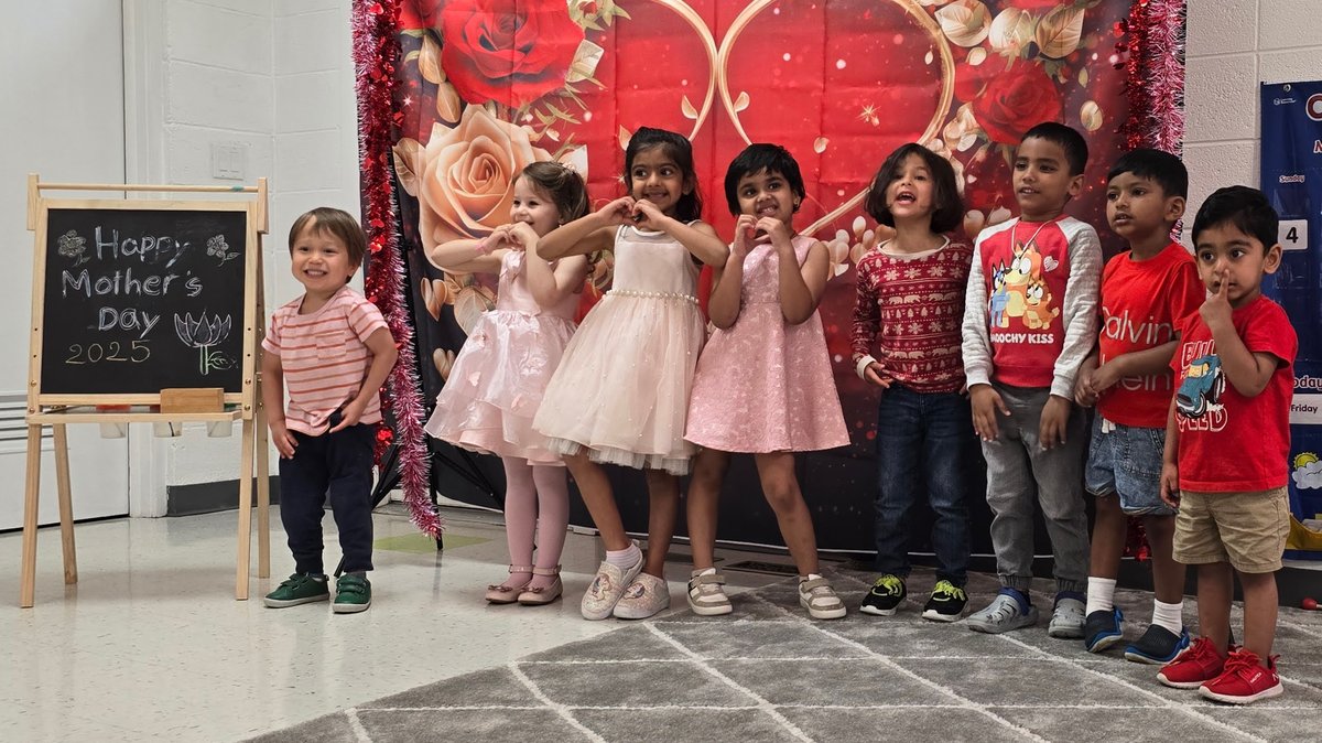Families gathering outdoors at a Milestones community celebration