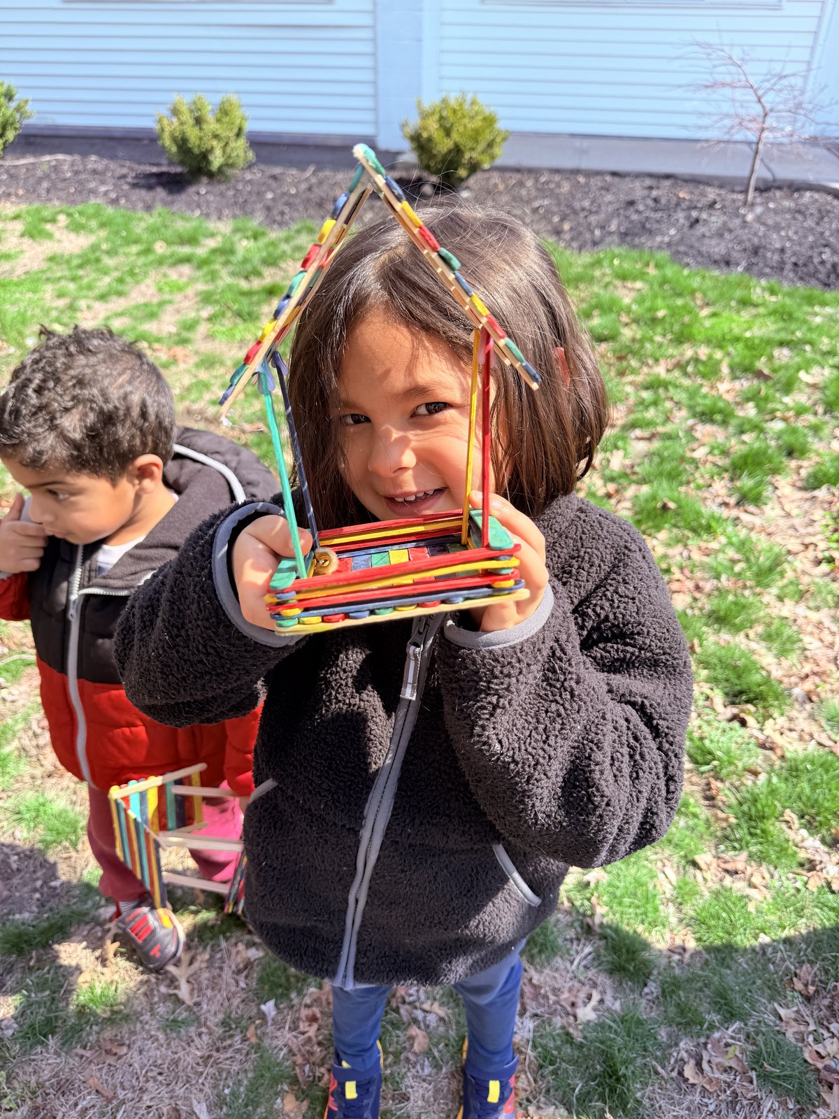 Student using Montessori geography puzzle map
