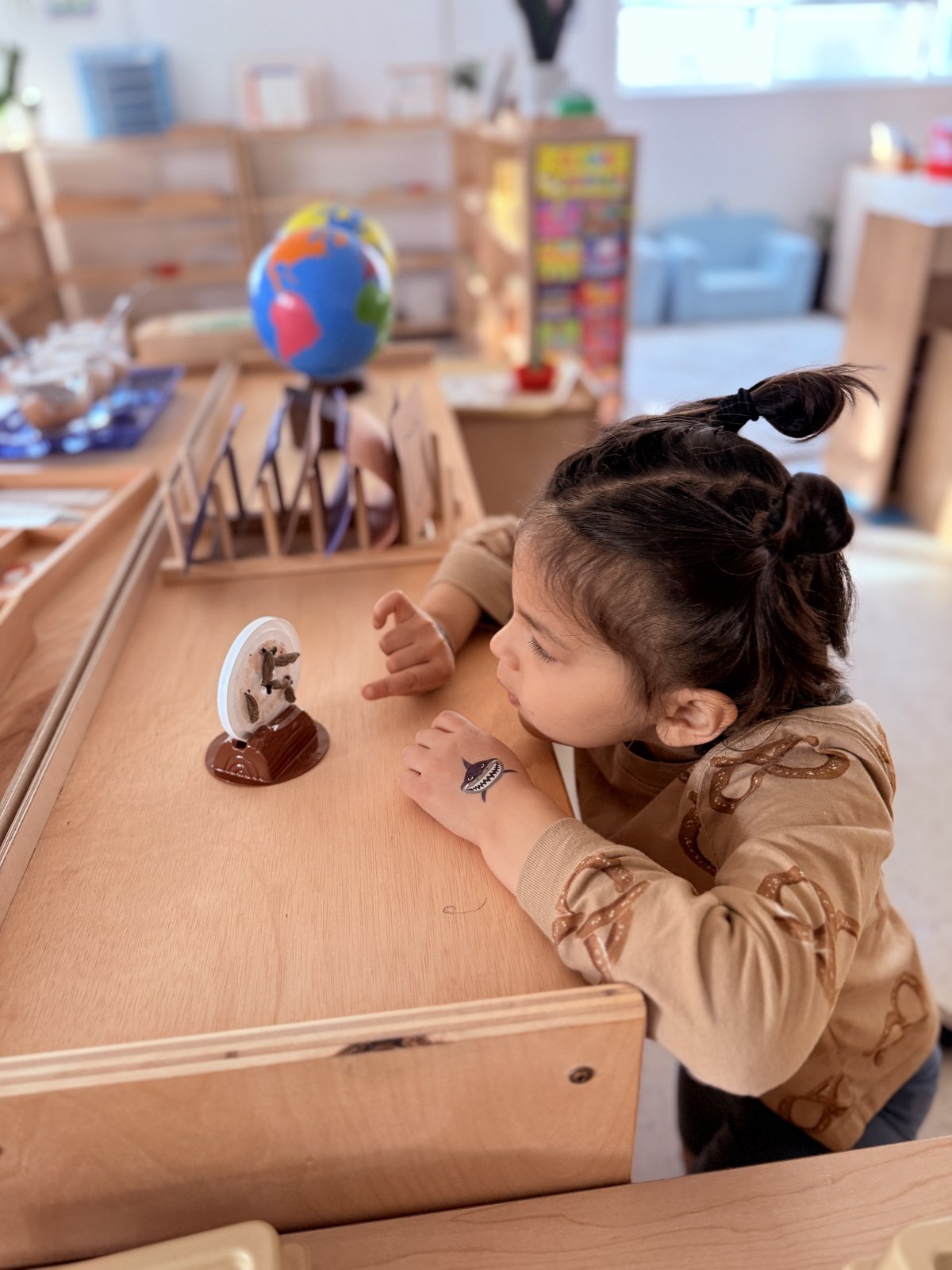 Two students exploring a hands-on science experiment