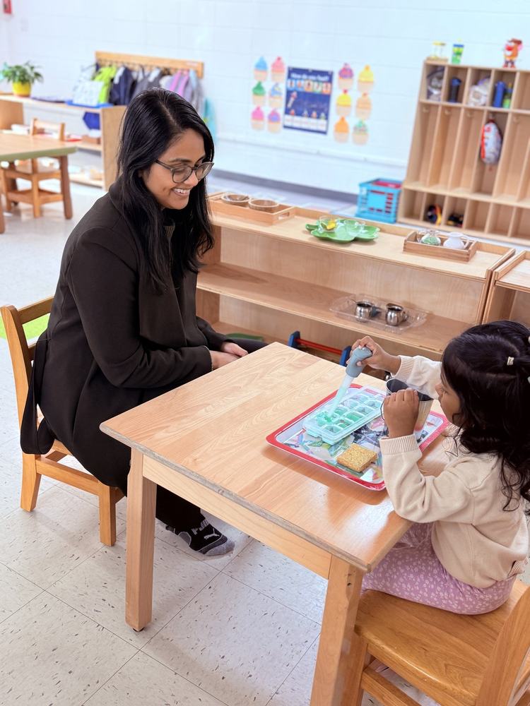 Student reading and exploring a Montessori classified reader